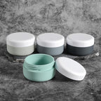 Kuangre Travel Containers for Toiletries, Silicone Cream Jars BPA-Free, Leak-proof 1.35oz Travel Size Containers, Portable Size Silicone Jars with Lid for Cosmetic Face Hand Body Cream (4 Pack)